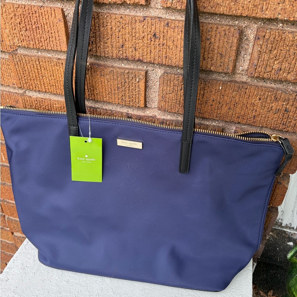 kate spade navy tote with black straps